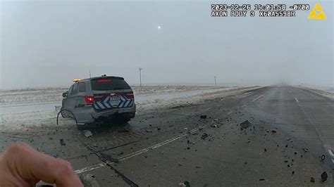 Colorado trooper dodges car by inches while helping people during I-70 blizzard