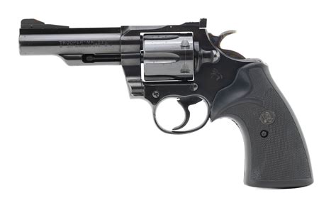 Colt Trooper MK III .357 Magnum Revolver. Nickel with wood grips with silver colored Colt insignia. Manufactured in 1974. Caliber / Gauge: .357 Magnum Barrel Length: 4". Mechanically in good .... 