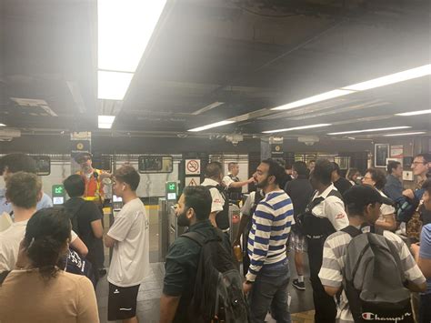 Commuters fume as trespasser on subway tracks halts service on stretch of Line 1