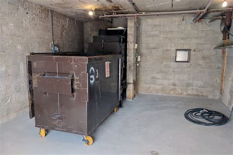 Compactor room in building.  Discover how you can estimate expected was...