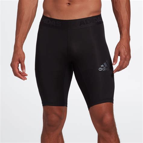 Compression shorts men. The Light Speed Compression Shorts with revolutionary Muscle Containment Stamping (MCS) technology are developed with a detailed understanding of the impact running has on the legs, reducing muscle movement, damage, and fatigue for your best run ever. Model wears a medium. SKU: MA5331b-BLK/BRF-XS. 