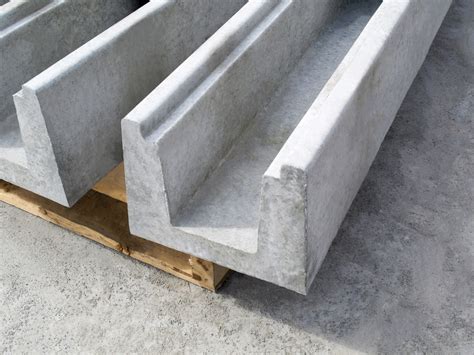 Concrete drain. These dimpled plastic sheets are available from several manufacturers and come in various length rolls, ranging from 4 feet to 9 feet 9 inches tall. Drainage sheets come with an integral termination strip. Cosella Dorken Products. The dimpled side is placed toward the foundation and holds the sheet about ½ inch from the wall. 