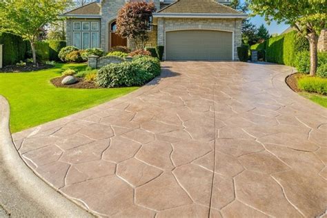 Concrete driveway costs. Oct 6, 2023 · Installing a concrete driveway costs $2,400 to $4,800 on average or $4 to $8 per square foot for plain gray concrete. Adding decorative colors, borders, stamped patterns, and finishes costs $8 to $18 per square foot. Concrete lasts 30 to 40 years and handles hot climates better than asphalt. 