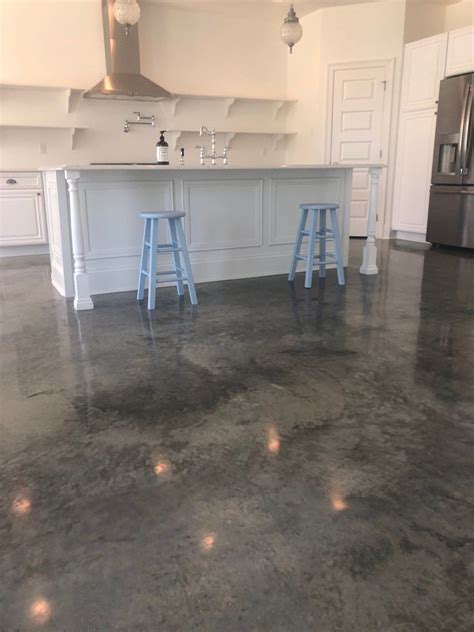 Concrete flooring cost. Oct 16, 2023 · The materials for this stained concrete project can cost from $456 to $980. Regarding the installation cost, the labor is estimated at $2,000 to $2,660. The price for a stained concrete pool deck is $7.40 to $10 per square foot, which means the whole project can cost from $2,543 to $3,640. 