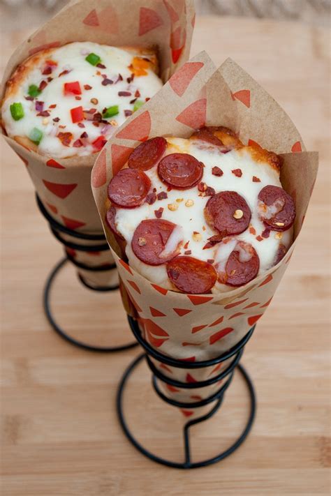 Cone cone pizza. Pizza Cono is marketing its product as a healthier alternative to traditional pizza. The new dough has white flour blended with wheat and an all-wheat version is on the way. That is nice, but the real attraction of the Pizza Cone may be the handy size and ease of eating. Americans are a mobile society that eats on the go. 