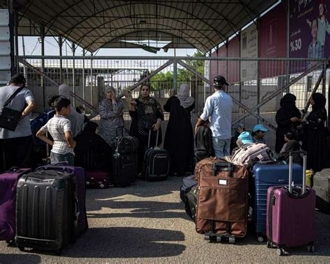 Confusion, frustration and hope at Gaza's border with Egypt as first foreign passport-holders depart