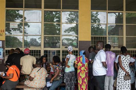 Congo conducts a 2nd day of voting after delays and closed polls keep people from casting ballots