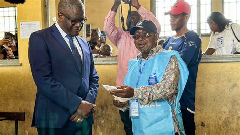 Congo votes for president as conflict and smudged ballots lead to fears election won’t be credible