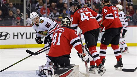 Connor Bedard leaves after Brendan Smith hit as Chicago Blackhawks lose 4-2 to New Jersey Devils