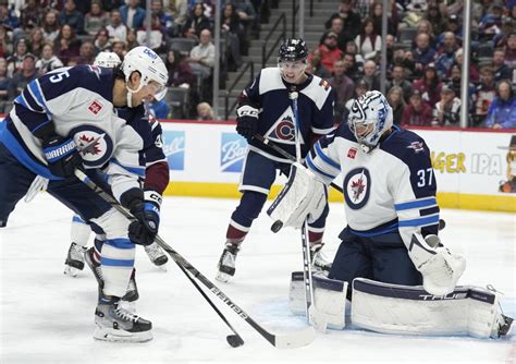 Connor Hellebuyck’s 250th career win helps Jets to a 4-2 victory over Avalanche