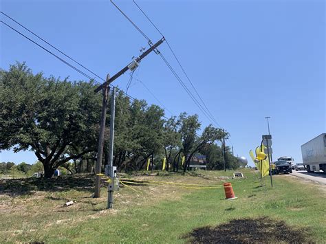 Construction vehicle causes power outage, grass fire in south Austin