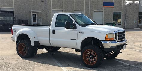 I have both a 2001 F350 XLT Dually and a 1999 F250 Lariat single wheel. Both trucks are identical body style and engines are 7.3s. The suspension packages are very similar with both trucks having rear overloads and the F250 having a camper package. The only difference is the dually is a standard and the F250 is automatic.