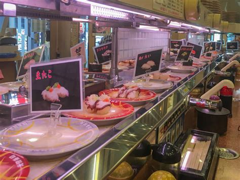 Kura Revolving Sushi Bar. *These food items are served raw 
