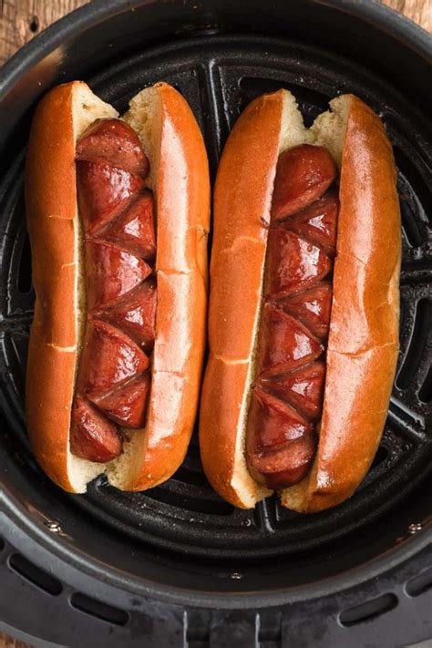 Cook hot dogs. 