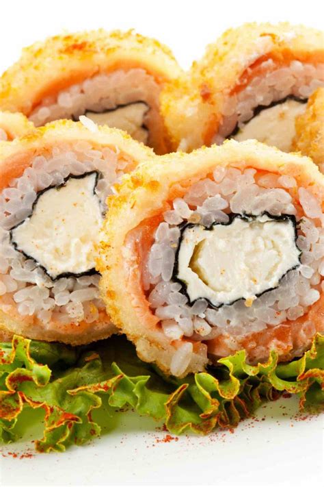 Cooked sushi rolls. For the rice: Mix together vinegar, sugar, and salt. Rinse the rice with cool water in a fine-mesh sieve; drain. Put the rice and water in a medium saucepan with a tight-fitting lid. 