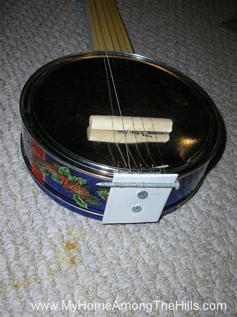 Cookie tin banjo Banjo, Homemade instruments, …