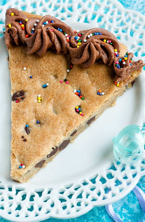 Cookieccake. Cookie Cake. Preheat the oven to 350F and grease the inside of a 9″ springform pan. Line the bottom with a sheet of parchment paper and set aside. In a medium mixing bowl, whisk together the flour, salt, and baking powder. 