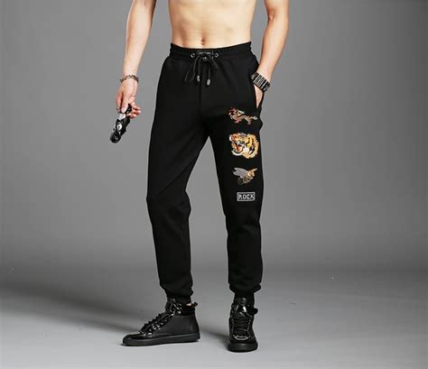 Cool mens sweatpants. Check out our cool sweatpants men selection for the very best in unique or custom, handmade pieces from our pants shops. 