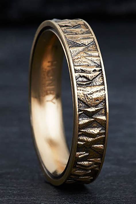 Cool mens wedding bands. Custom Men's Diamond and Mokume Wedding Band. Design your own unique men's ring online or in person. We can create any ring you dream up. Shop our large collection of one of a kind, unique wedding bands for men. We work with platinum, gold, diamonds, sapphires, gemstones, and engraving to make it the perfect ring. 