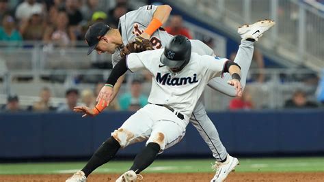 Cooper and Segura homer, López and Robertson play key roles as Marlins beat Tigers 8-6