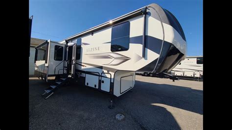 Don't let this cold snap get you down, hop on into Copper City RV and check out this Sprinter Limited 3610FKS! With this units unique front kitchen floor plan you are sure to catch the attention of everyone at your favorite campsite. . 