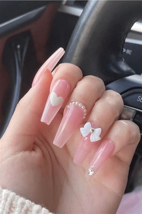 Coquette nails. Coquette nails are inspired by flirty and girly details, such as bows, pearls, hearts, and florals. Learn how to create this look with shimmery bases, 3D … 
