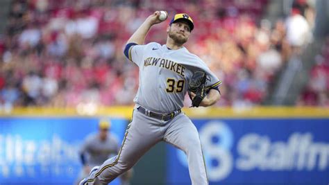 Corbin Burnes overcomes heat scare to fan 13 in the Brewers’ 1-0 victory over the Reds