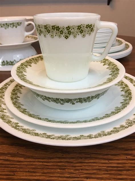 A Corelle Watercolors place setting includes: 10¾-inch Dinner Plate, 8½" Salad Plate, 18-ounce Soup/Cereal Bowl, and 11-ounce Stoneware Mug. Microwave and dishwasher safe. The Corelle Watercolors pattern was produced from 2005 to 2020.. 