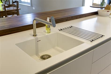 Corian sink. Specifying Corian ® materials, sinks and panel shapes is simplified for architects and designers, thanks to a seamless integration with the Autodesk Revit ® software program. Professionals using the software now have instant access to Corian ® materials, shapes and colors, enabling them to create color-accurate renderings of counters or exterior and … 