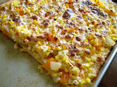 Corn on pizza. Non-sweet corn, e.g., dent corn, is dried and used as meal, cereal, masa, or animal fodder in the U.S. Sweet corn, the kind we eat as unground kernels here in the U.S., fresh, frozen, or canned, is sweet. It does NOT belong on pizza. FRESH (sweet) corn-on-the-cob, steamed and lightly buttered, is absolute HEAVEN. 