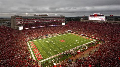 Cornhuskers stadium capacity. Memorial Stadium. With expanded capacity now reaching beyond 85,000, Nebraska has continued its NCAA-record streak of consecutive sellouts that dates back to 1962 and is at 382 games entering the 2022 season. Nebraska celebrated its 300th consecutive sellout with a stadium record crowd against Louisiana-Lafayette in 2009. 