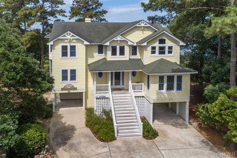 Corolla nc real estate. About This Home. 1017 Ocean Trail Unit 8A. Rare find in the much sought after Beacon Quarters. Perfectly situated between the ocean and sound, this two bedroom, … 