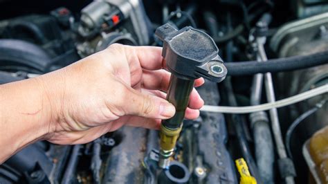 Cost of engine coil replacement. Symptoms of a bad ignition coil include backfiring, bad fuel economy, and stalling and starting issues. Before the ignition coil is replaced, the engine will need to be properly di... 