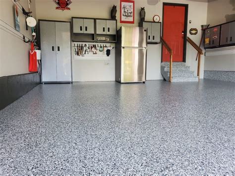 Cost of epoxy garage floor. The actual garage floor coating cost will depend on your chosen epoxy paint. Generally speaking, larger areas provide better value due to setup and preparation costs. For a single-car garage, expect to pay around $60 per square metre , while opting for a double-car garage from the same installer could cost $50 per m2 . 