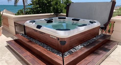 Cost of hot tub. May 31, 2023 · According to Angi, inground hot tub cost ranges from $500 to $25,000, with the national average at $15,000. Hot tub installation costs can skyrocket to $35,000 or more, depending on the... 