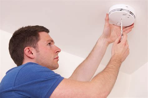 Using a drill, screw the mount until it is secure. Be careful not to overtighten. 6. Install a battery, if necessary. Some smoke detectors need a battery to be installed, while others have a sealed battery that fails after the smoke detector needs replacement. 7. Connect the smoke detector to the mount and wires.. 