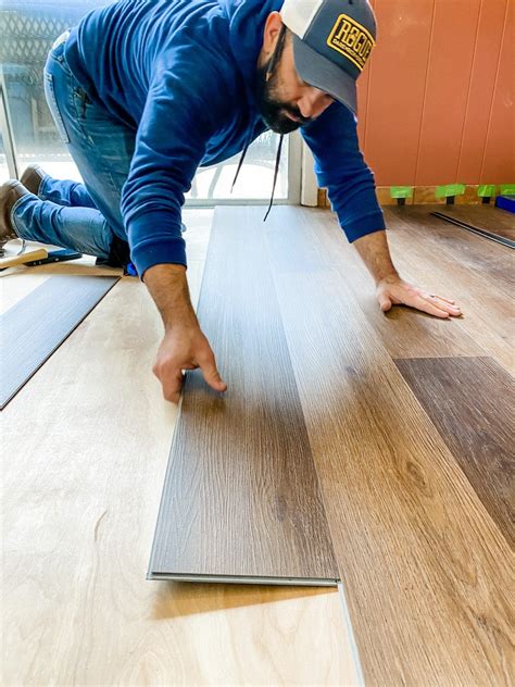Cost to install vinyl plank flooring. Rarely will a vinyl plank floor cost as much as genuine wood flooring, which is usually five to 10 times more expensive than vinyl planks. Prices for materials usually range from $2.50 to $5 per square foot. Professional installation can add $1 to $3 per square foot, but this is one of the easier flooring materials to install yourself ... 