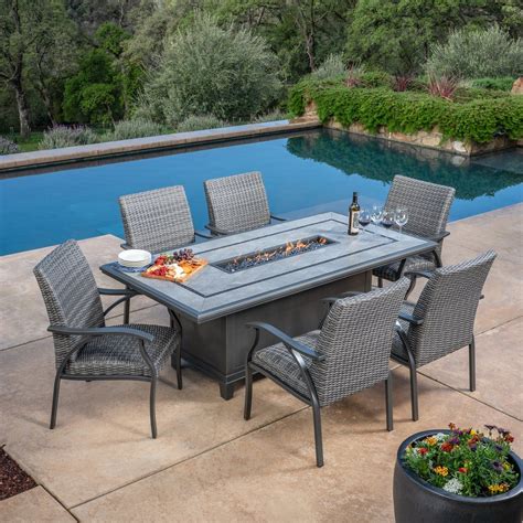 Costco patio table set. Rivermont 9-piece Dining Table Set Multi-Step Hand Applied Finish Constructed of Rubberwood Solids and Mindi Veneer Chairs Upholstered in Ivory Fabric 20” Self-Storing Butterfly Leaf Metal Glide Mechanism for ... Outdoor Patio Fire Pit Sets; Outdoor Patio Furniture Covers; Outdoor Patio Umbrellas & Sun Shade Sails; ... Costco Business … 