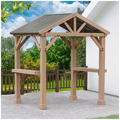 Create a perfect outdoor room within your backyard space with the Yardistry 12’ x 10’ Wood Gazebo with an Aluminium Roof. Dine al fresco, play cards, enjoy an outdoor drink, or just enjoy a quiet moment in the shade. It’s the perfect size for sheltering your outdoor furniture. Sturdy, 6” x 7” posts with classic plinths ensure this ...