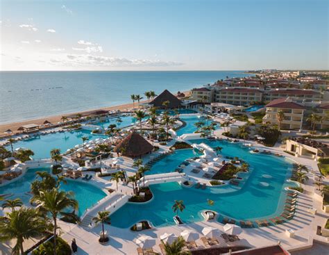 Feb 7, 2023 · Blvd. Kukulcan, Manzana 51, Lote. 7, Cancun, Quintana Roo, 77500, Mexico. Located within the lively Cancun hotel zone, this beachfront all-inclusive resort is uniquely surrounded on three sides by the Caribbean Sea. The resort features stunning pools, numerous dining venues, including a microbrewery and a sweet shop, a kids’ club with a water ... . 