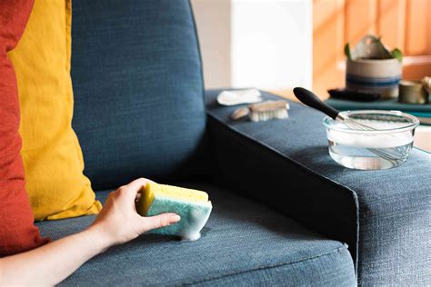 Couch cleaning. Make sure your work area is well ventilated. Apply dry cleaning solvent to a clean towel and gently brush over generally dirty areas of upholstery. You can work solvent into heavily soiled areas ... 
