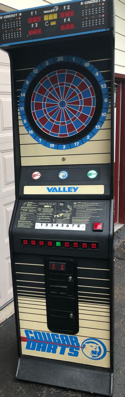 Source eBay. You are bidding on a Valley Cougar Electronic Dart Board with Honest Ernie In Very Good Clean Condition! Dimensions: 24" Wide X 24" Deep at Base X 86 1/2" Tall Unit folds in half for simple moving and storage. Folded Dimensions: 24" Wide X 36" Deep X 45 1/2" Tall BUILT-IN GAMES INCLUDE: 301/501/701/901, Shanghai, High Score ....