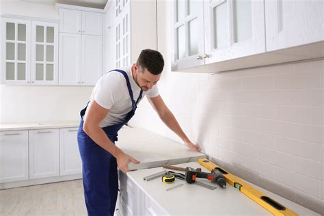 Countertop install. 1. Cut countertops to size. Use a fine-tooth saw to cut the laminate board to the right length. The edges can be neatened with a file. Measure very carefully before … 