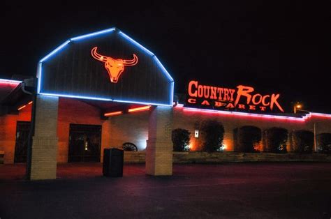 Country rock cabaret illinois. It’s called the Country Rock Cabaret, and it’s one of a collection of nightclubs that light up this otherwise gloomy industrial area in Sauget, Illinois, just across the Mississippi River from ... 
