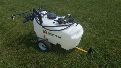 CountyLine 25 gal. 2-Nozzle Trailer Sprayer Max 70 PSI 38 ft. Vertical Spray 26 ft. Horizontal Spray Designed to tow behind your standard ATV, UTV, or lawn tractor Comes with a 2.5 GPM, 1AGM, 12-volt diaphragm pump that has quick-connect alligator clips for a smoother operation