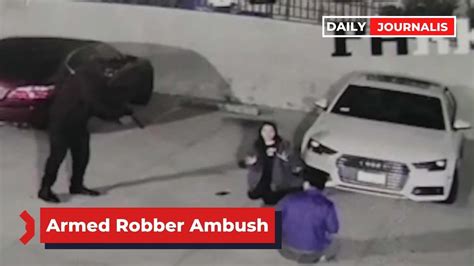 Couple ambushed by armed robber in Koreatown
