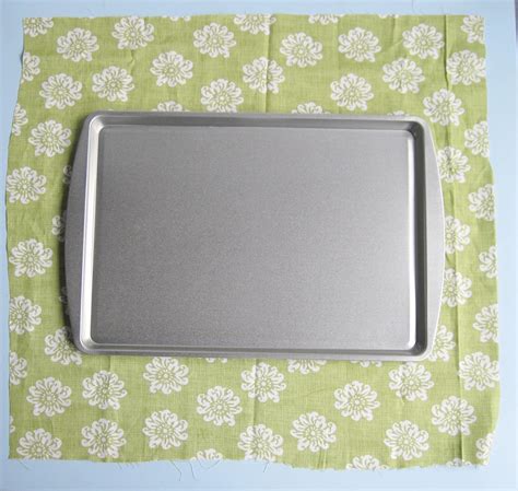 Cover a cookie sheet with fabric and it a quick and easy