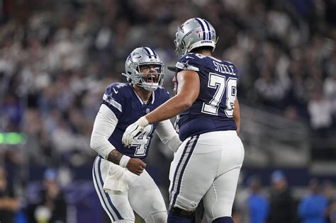 Cowboys deny Lions on 2-point try for 20-19 win to extend home win streak to 16