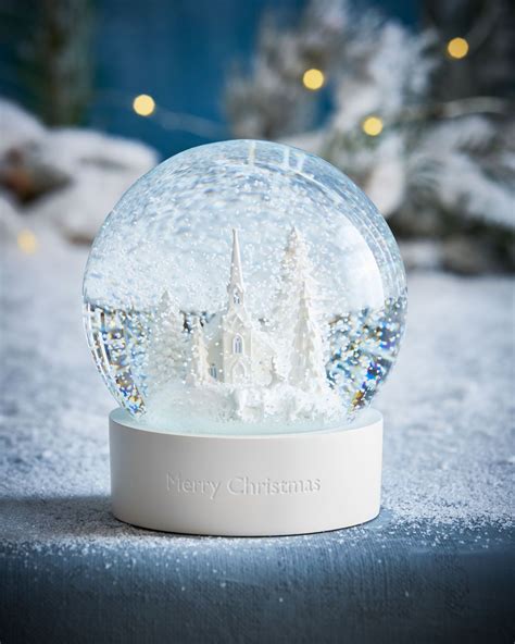 Product Details. Capture the serenity of the season with our Snowman Snow globe with Music! This tabletop decor features birch bark texture, pops of bright color and loads of traditional Christmas charm. You'll love this whimsical take on the classic snow globe for your home or office this holiday season, and for many more to come!. 