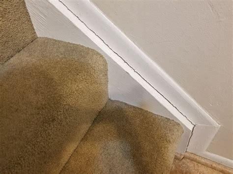 Cracks between skirting board and wall on stairs - Best way to …